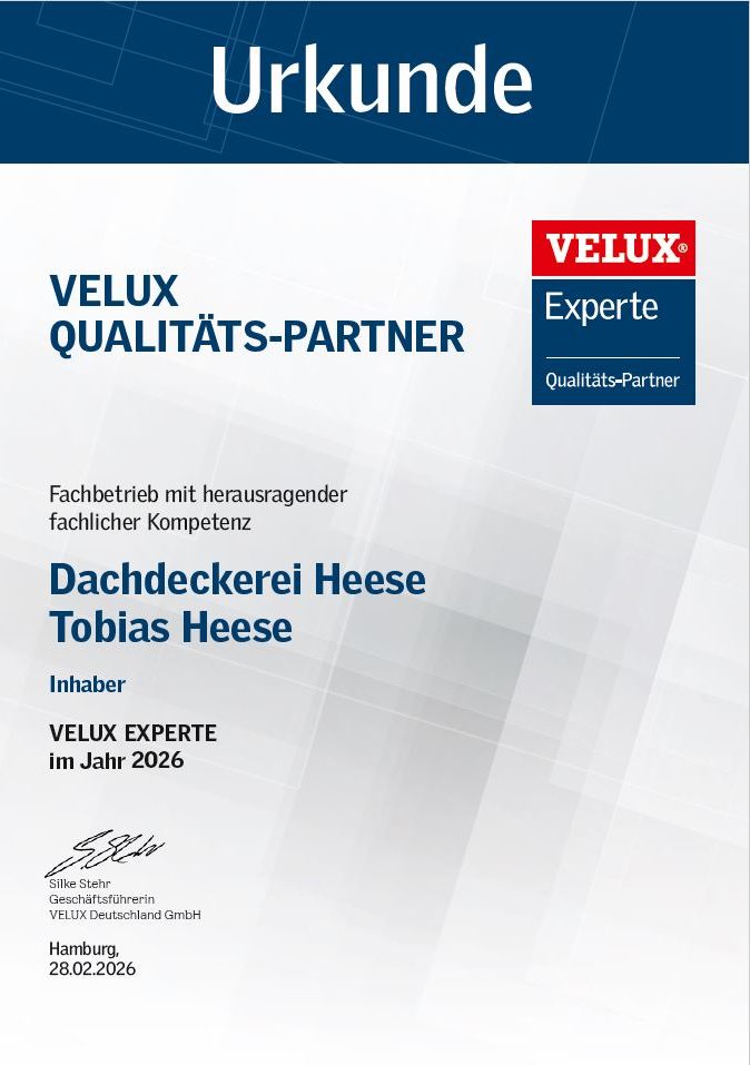 Logo von VELUX mit dem Wort "Experte" in heller Schrift auf dunklem Hintergrund.